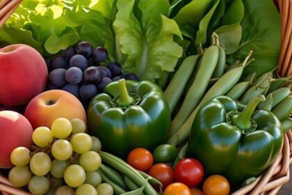 Assorted fresh fruits and vegetables arranged together