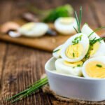 Healthy weight loss foods including fruits, eggs, yogurt, and greens