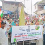 Municipal workers sweeping streets during Margherita cleanliness drive