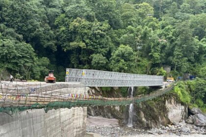 Vehicles crossing Sanklang Bridge after reopening in North Sikkim