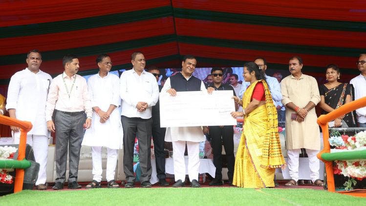 Assam CM Himanta Biswa Sarma distributing seed capital to women entrepreneurs in Hojai