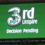 Giant screen used for third umpire decision in local cricket match Mohanpur