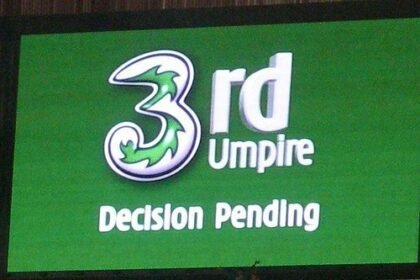 Giant screen used for third umpire decision in local cricket match Mohanpur