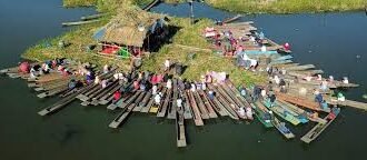 Volunteers cleaning waste along the banks of Loktak Lake in Manipur
