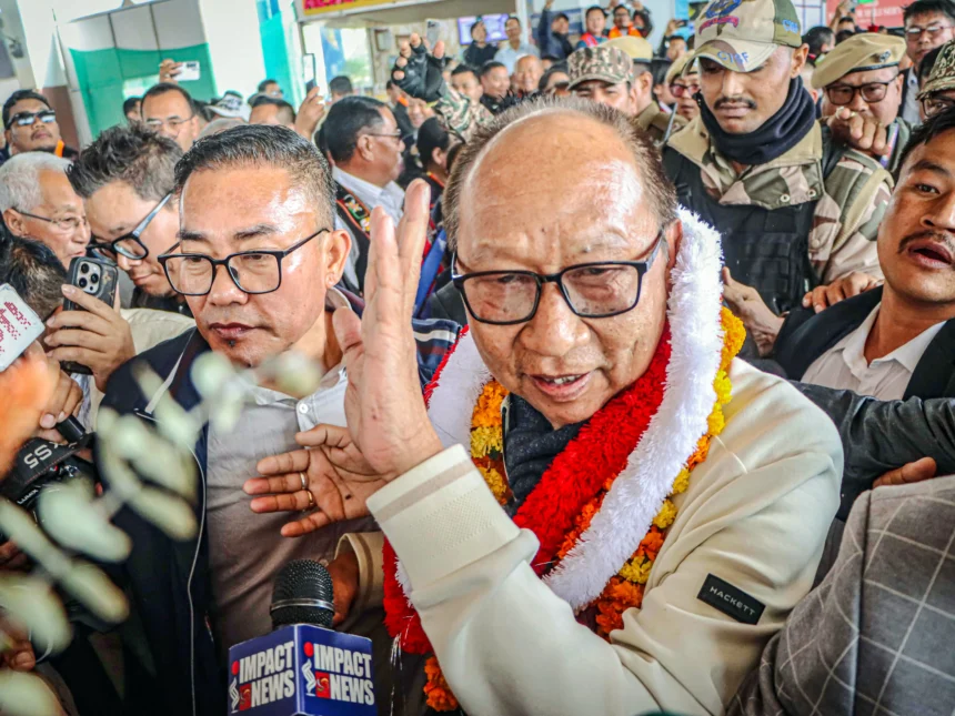 Yamnam Kimchan Singh taking oath during Manipur new leadership swearing ceremony