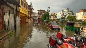 Waterlogged Agartala flyover with vehicles struggling amid leakage and heavy rain conditions