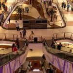 Influencers creating content during fashion takeover at Central Mall Guwahati