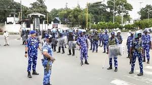 Police enforcing curfew in Imphal with patrols and arrests during unrest and violations