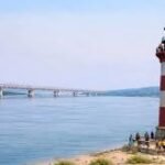 Lighthouse structure along Brahmaputra River guiding boats and improving inland navigation safety