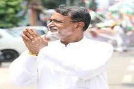 Political leaders discussing allegations related to CM Relief Fund misuse