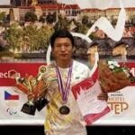 Biri Takar from Arunachal Pradesh holding gold medals at para badminton tournament in Prague