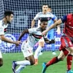 NorthEast United FC players competing in an Indian Super League football match
