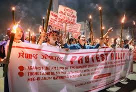 Empty streets and protest gatherings in Manipur during shutdown caused by protests over civilian killings