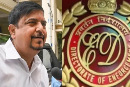 ED officials escort former West Bengal minister Sujit Bose during recruitment scam investigation
