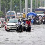 Heavy rainwater flooding streets and disrupting traffic in Guwahati during severe storm warning