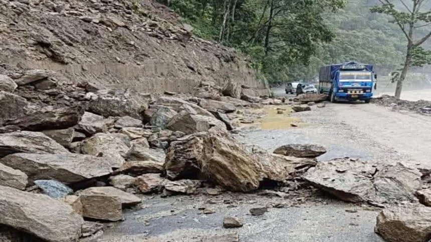 Landslip debris blocking National Highway 10 in Sikkim during heavy monsoon rainfall