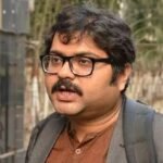 Police escort activist Garga Chatterjee after arrest in EVM misinformation case in West Bengal