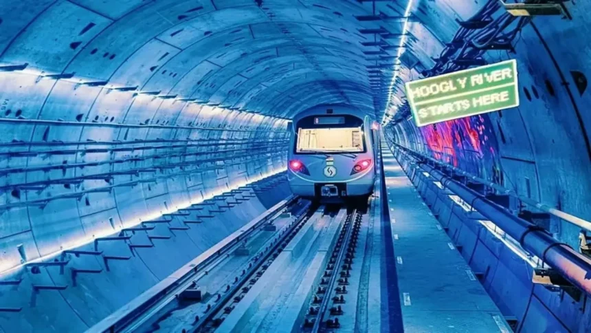 Modern Kolkata Metro train operating inside underwater tunnel beneath the Hooghly River during Green Line commercial services