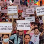 Women participating in peaceful sit-in demonstration in Kangpokpi demanding accountability and justice.