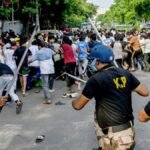 Kolkata Police personnel conducting investigation and security operations in Park Circus after violent protest