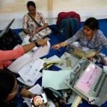 Assembly Poll Vote Counting 2026 with officials counting votes and monitoring election results