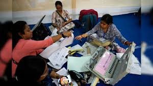 Assembly Poll Vote Counting 2026 with officials counting votes and monitoring election results