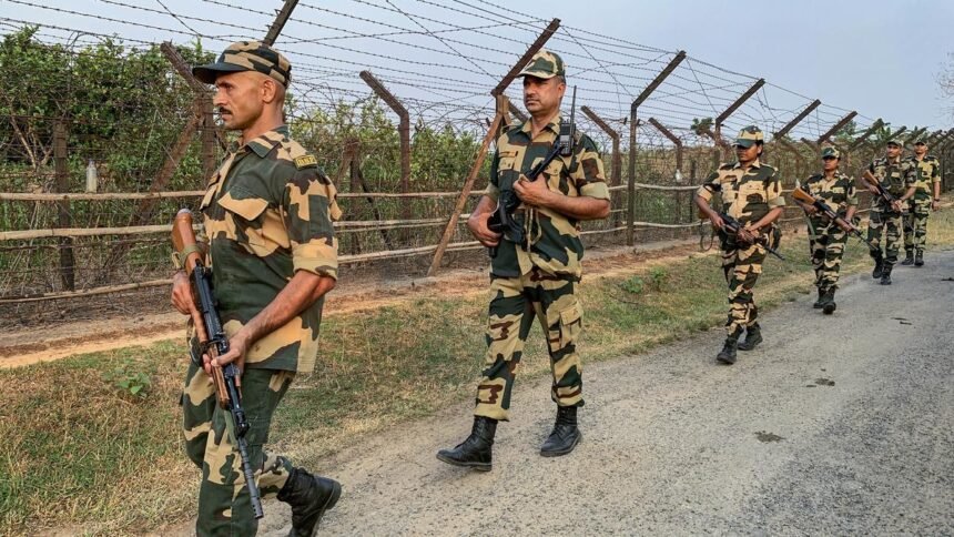 Security personnel and emergency responders near the Sonamura border area following a firing incident involving an injured youth