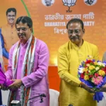 BJP supporters celebrate after Jahar Chakraborty's victory in the Dharmanagar Assembly bypoll