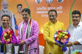 BJP supporters celebrate after Jahar Chakraborty's victory in the Dharmanagar Assembly bypoll