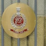Enforcement Directorate officials conducting arrest operation linked to municipal recruitment scam investigation in Kolkata