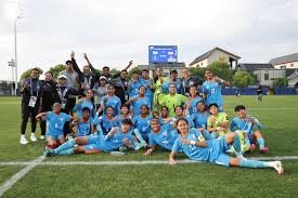 Manipur U-20 football players celebrating semi-final qualification after comeback victory against West Bengal