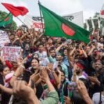 Left-front youth wing members participate in a sit-in demonstration in Agartala demanding regularisation of contractual state government employees.