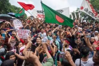 Left-front youth wing members participate in a sit-in demonstration in Agartala demanding regularisation of contractual state government employees.