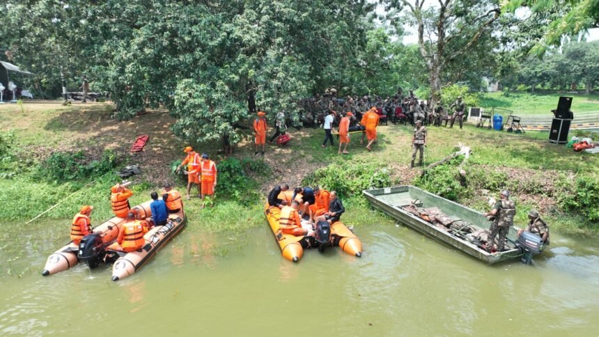 Senior disaster management officials in a high-level meeting reviewing rescue equipment, relief plans, and emergency response strategies ahead of the monsoon season in Tripura.
