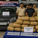 Tripura Police and BSF personnel inspect a vehicle after seizing a large quantity of suspected dried cannabis during a highway interception operation.