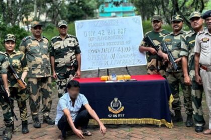 BSF and Tripura Police personnel display seized Yaba tablets recovered near the border fencing in the Raghna area during an anti-narcotics operation.
