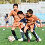 Young football players training at Mizoram State Sports Academy during a free coaching programme for emerging regional talent.