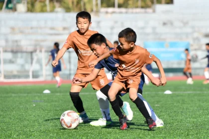Young football players training at Mizoram State Sports Academy during a free coaching programme for emerging regional talent.