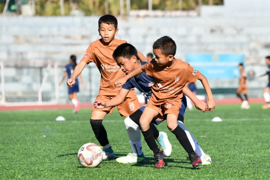 Young football players training at Mizoram State Sports Academy during a free coaching programme for emerging regional talent.