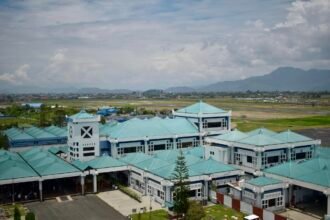 Passengers move through upgraded facilities at Imphal International Airport during the observance of Yatri Suvidha Diwas.