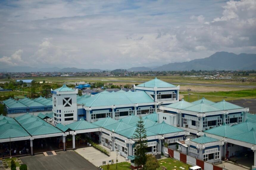 Passengers move through upgraded facilities at Imphal International Airport during the observance of Yatri Suvidha Diwas.