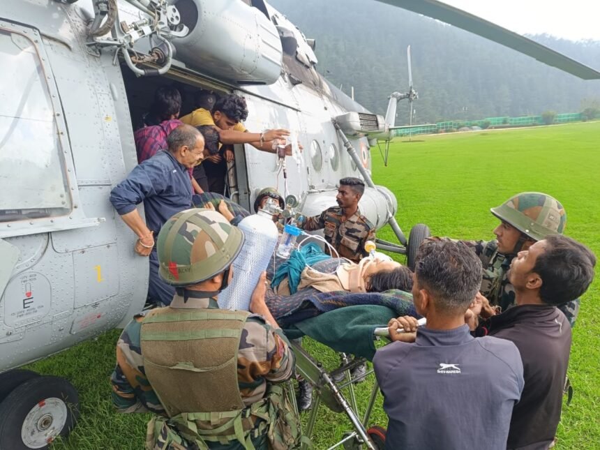 Indian Air Force helicopter evacuating simulated injured personnel during a high-altitude rescue drill in Tawang Arunachal Pradesh.