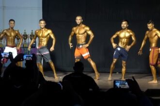 Natural bodybuilders from Meghalaya celebrate after winning gold medals at the national bodybuilding championships in Bengaluru.