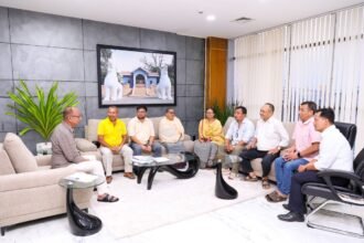 Civil society representatives handing over a memorandum to a central delegation in Manipur during an official meeting.