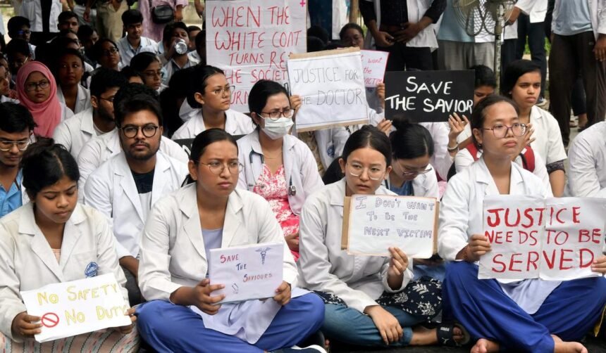Medical students in Assam holding placards during a peaceful demonstration demanding transparent rural posting guidelines.