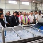 Nirmala Sitharaman inaugurating a large organic spice processing plant in Ri-Bhoi, Meghalaya, with officials and farmers present.