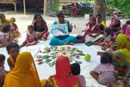 Anganwadi worker distributing nutritional supplements to pregnant women in a rural Mizoram village under a welfare scheme.