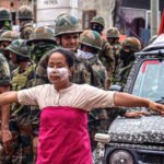 Community leaders addressing supporters after the lifting of an emergency shutdown in Manipur.