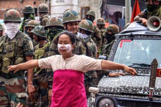 Community leaders addressing supporters after the lifting of an emergency shutdown in Manipur.