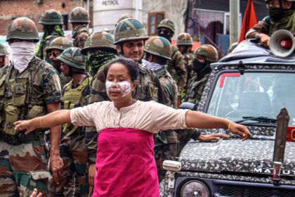 Community leaders addressing supporters after the lifting of an emergency shutdown in Manipur.